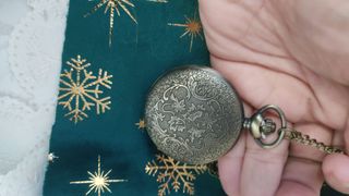 Orologio da tasca vintage con moto