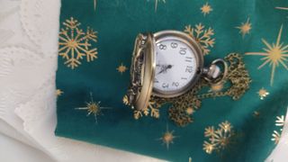 Orologio da tasca vintage con moto