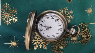 Orologio da tasca vintage con moto