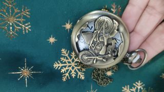 Orologio da tasca vintage con moto