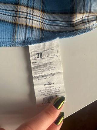 Faldilla de quadres plisada curta