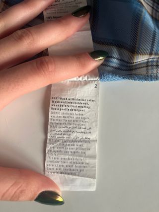 Faldilla de quadres plisada curta