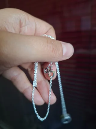 Collar plateado con dos aros