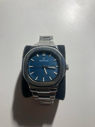 Reloj Fairwhale Azul y Plateado