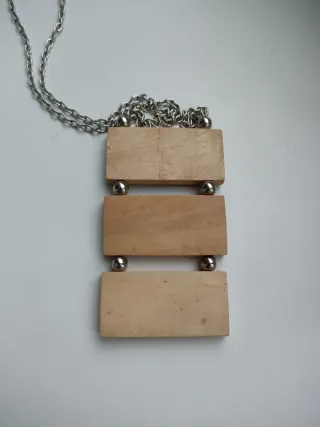 Colgante de madera con árbol y elefante