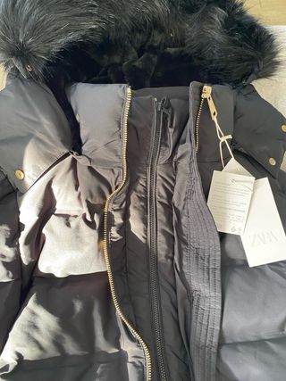 Plumífero con capucha, a estrenar