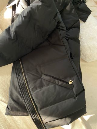 Plumífero con capucha, a estrenar