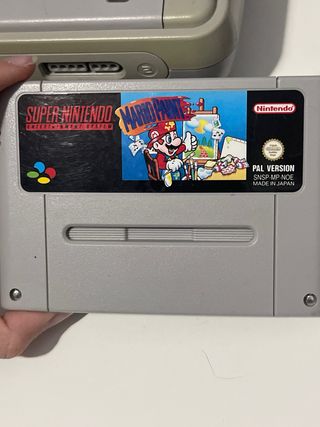 Console Super Nintendo SNES con controller e gioco