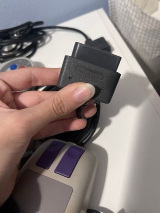 Console Super Nintendo SNES con controller e gioco