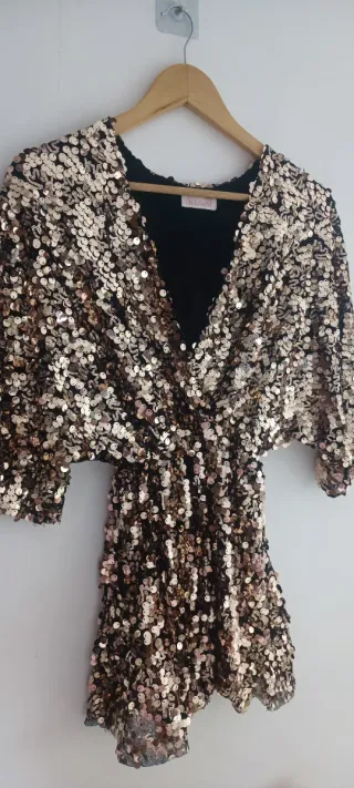 Mono fiesta lentejuelas negro y dorado