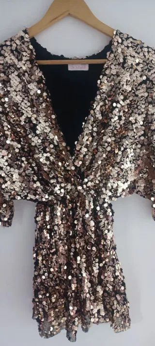 Mono fiesta lentejuelas negro y dorado