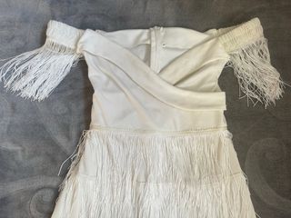 Vestido blanco con flecos