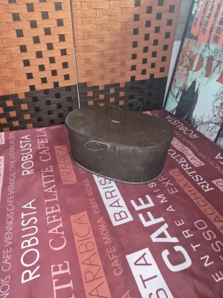 Rustidera antigua de metal