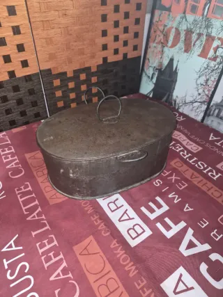 Rustidera antigua de metal