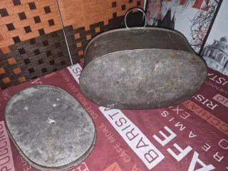 Rustidera antigua de metal