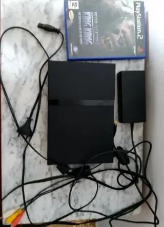 PlayStation 2 Slim + Gioco King Kong + Trofeo turistico