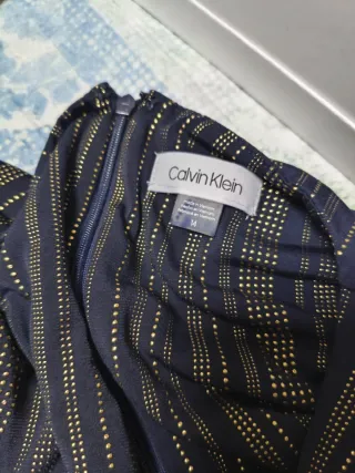 Mono fiesta Calvin Klein azul y dorado