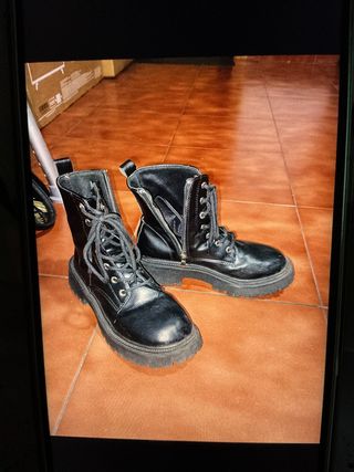 Botines negros altos con cremallera