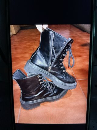 Botines negros altos con cremallera