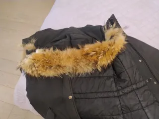 Giaccone Woolrich nero con cappuccio