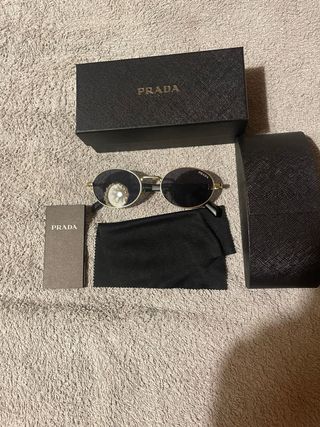 Occhiali da sole Prada oro e neri