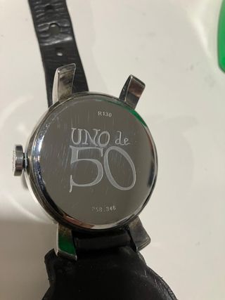 Reloj de pulsera plateado y marrón