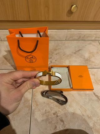 Pulsera Hermès Dorada y Blanca