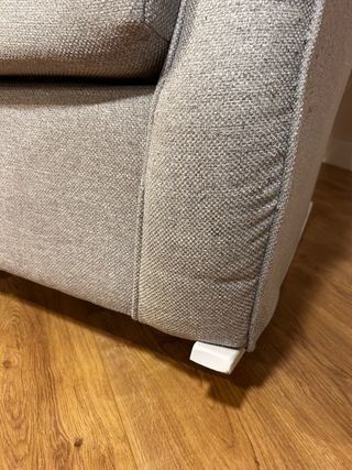 Comoda poltrona a dondolo imbottita in tessuto