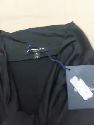 Blusa negra con lazada