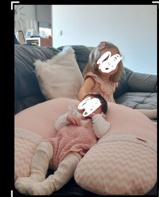 Almofada de amamentação como nova