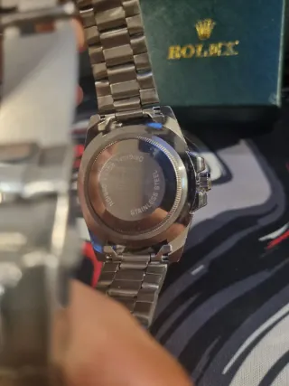 Reloj esfera negra y plateada