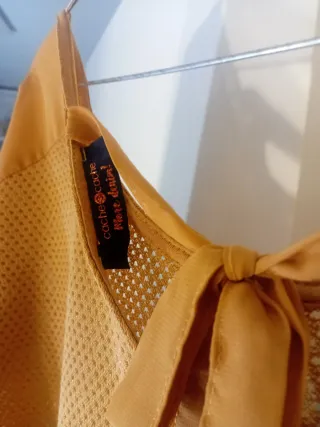 Blusa amarilla manga larga ,usado  una vez