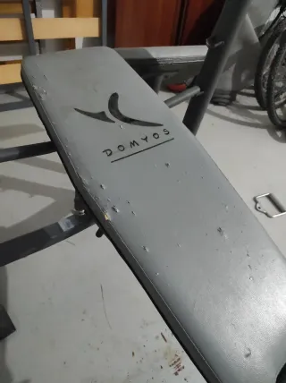 Máquina de pesas multifunción con barras y pesas