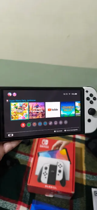 Nintendo Switch OLED Bianca + custodia di trasporto