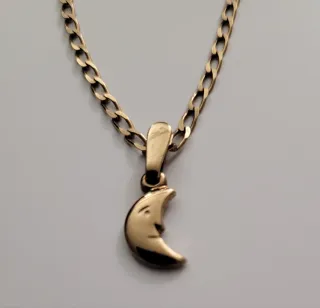 Conjunto colgante y pulsera luna.