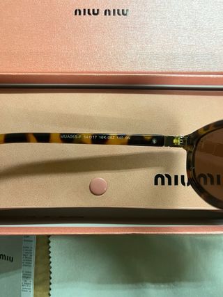 Occhiali da sole Miu Miu Tortoise