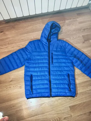 Plumífero azul hombre