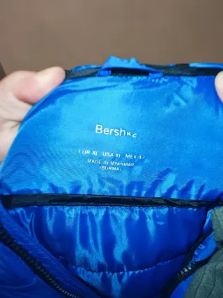 Plumífero azul hombre