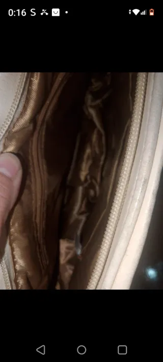 Bolso blanco con pedrería plateada