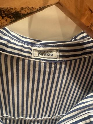 Blusa sin mangas rayas azul y blanco