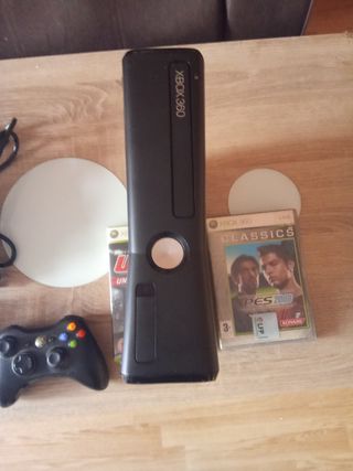 Xbox 360 Slim + 2 Giochi.
