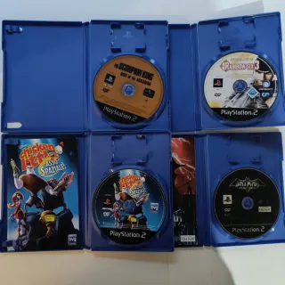 Sony PS2 Slim + Controller + 4 Giochi + Accessori