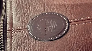 Maleta vintage imitacion cuero.