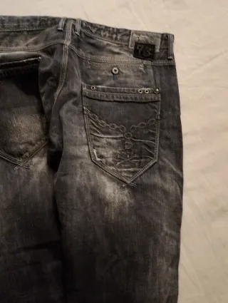 Pantalón vaquero hombre gris