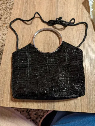 Borsa da festa con strass e cinture abbinate