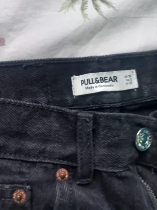 Pantalones negros rotos