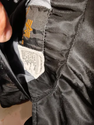 Chaqueta Alpha Industries MA1 Negra Naranja