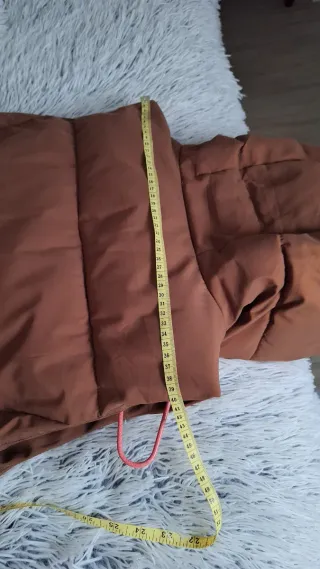 Parka larga sin mangas marrón