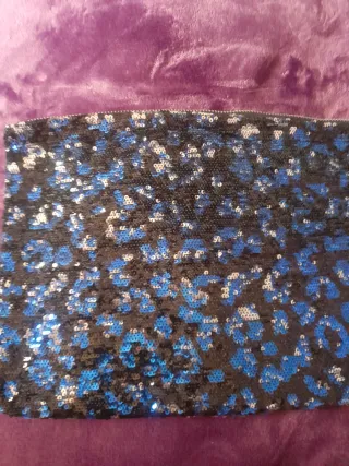 Cartera de mano lentejuelas animal print