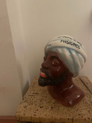 Hucha Domund. en buen estado.